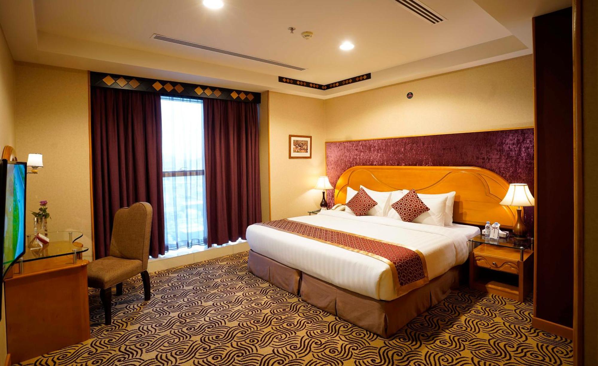 อวาลิฟ อินเตอร์เนชั่นแนล โฮเต็ล Hotel ฏออิฟ ห้อง รูปภาพ A bedroom at the hotel